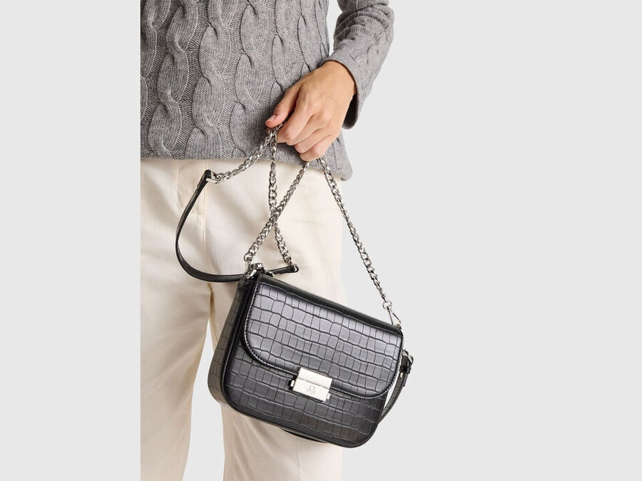 small black be bag with coconut print