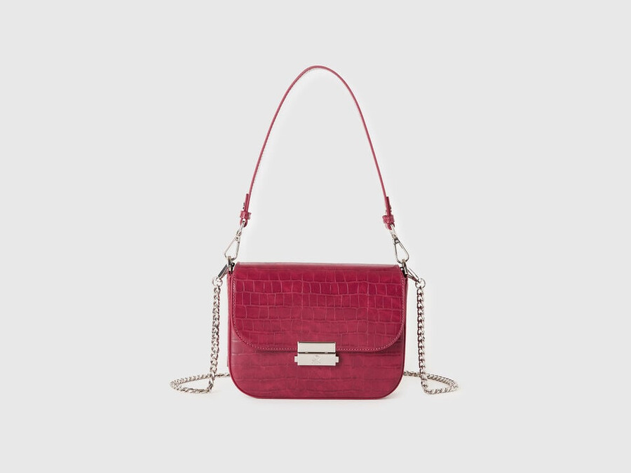 small red be bag with coconut print