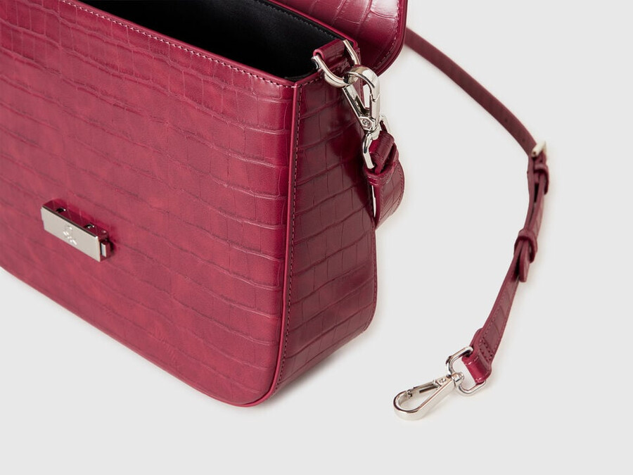 large red be bag with coconut print