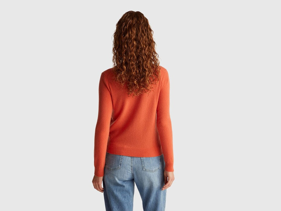 orange crew neck sweater in merino wool