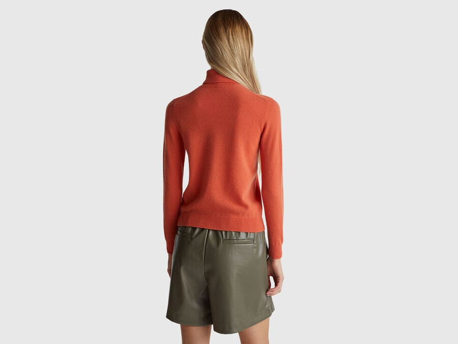 orange turtleneck sweater in pure merino wool