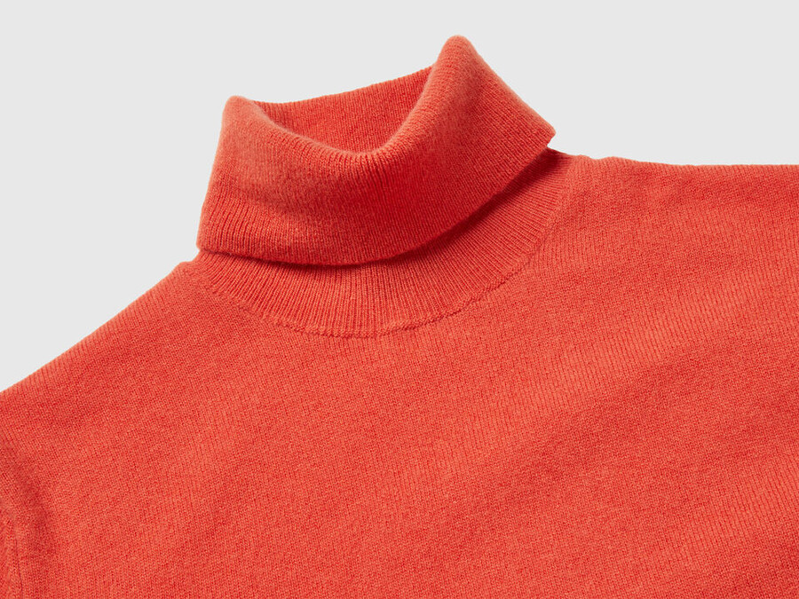 orange turtleneck sweater in pure merino wool