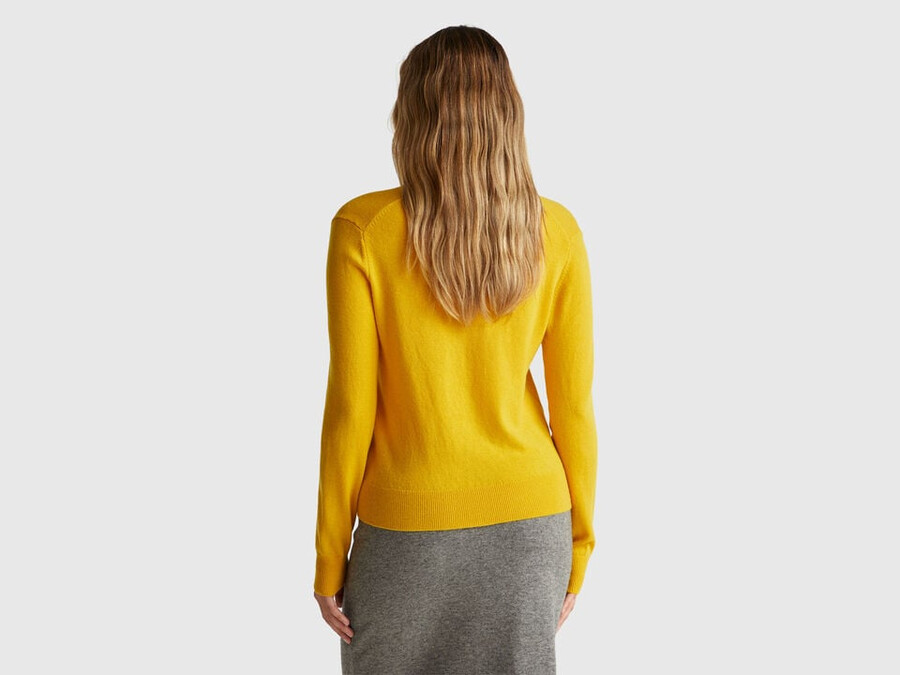 ocher yellow v-neck sweater in pure merino wool
