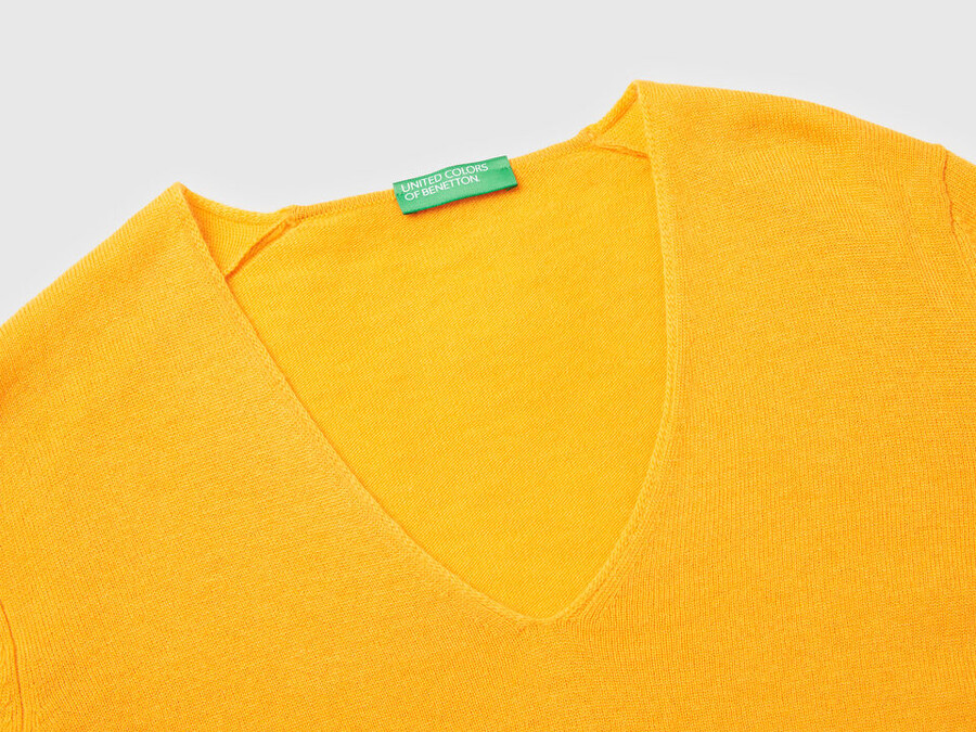 ocher yellow v-neck sweater in pure merino wool