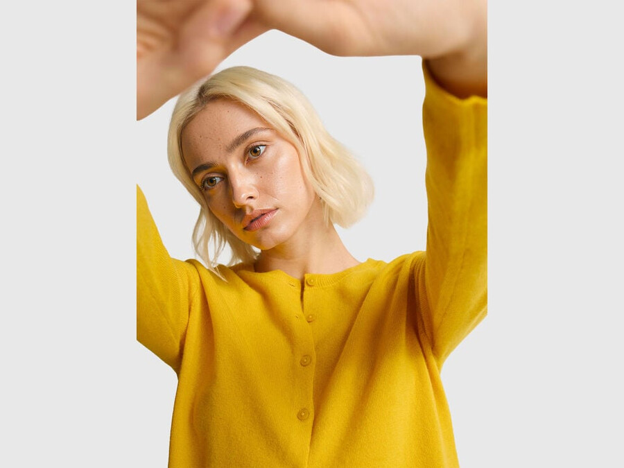 ocher yellow crew neck cardigan in pure merino wool